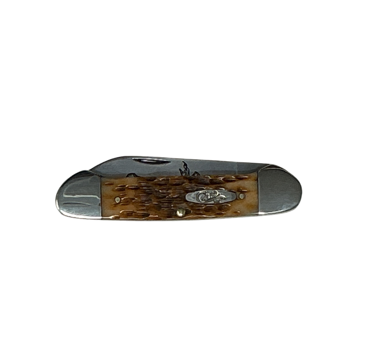 Case Amber Bone Peach Seed Jig Canoe