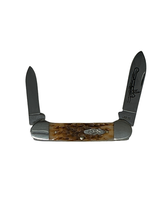 Case Amber Bone Peach Seed Jig Canoe