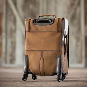COWHIDE ROLLING SUITCASE